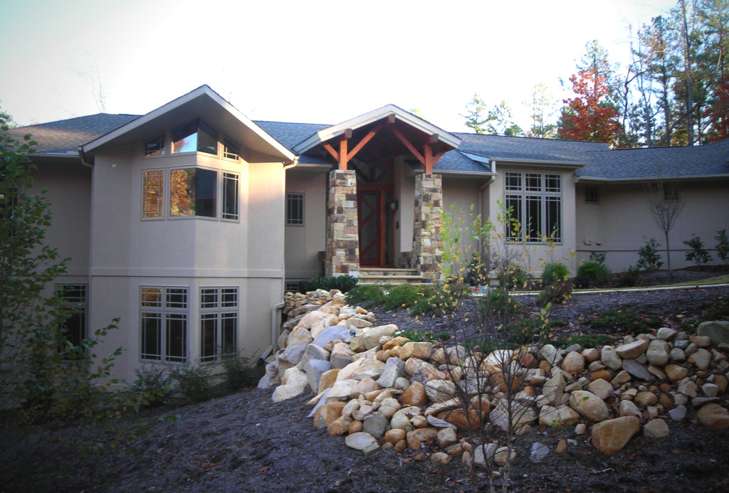 Photo of a custom home exterior.