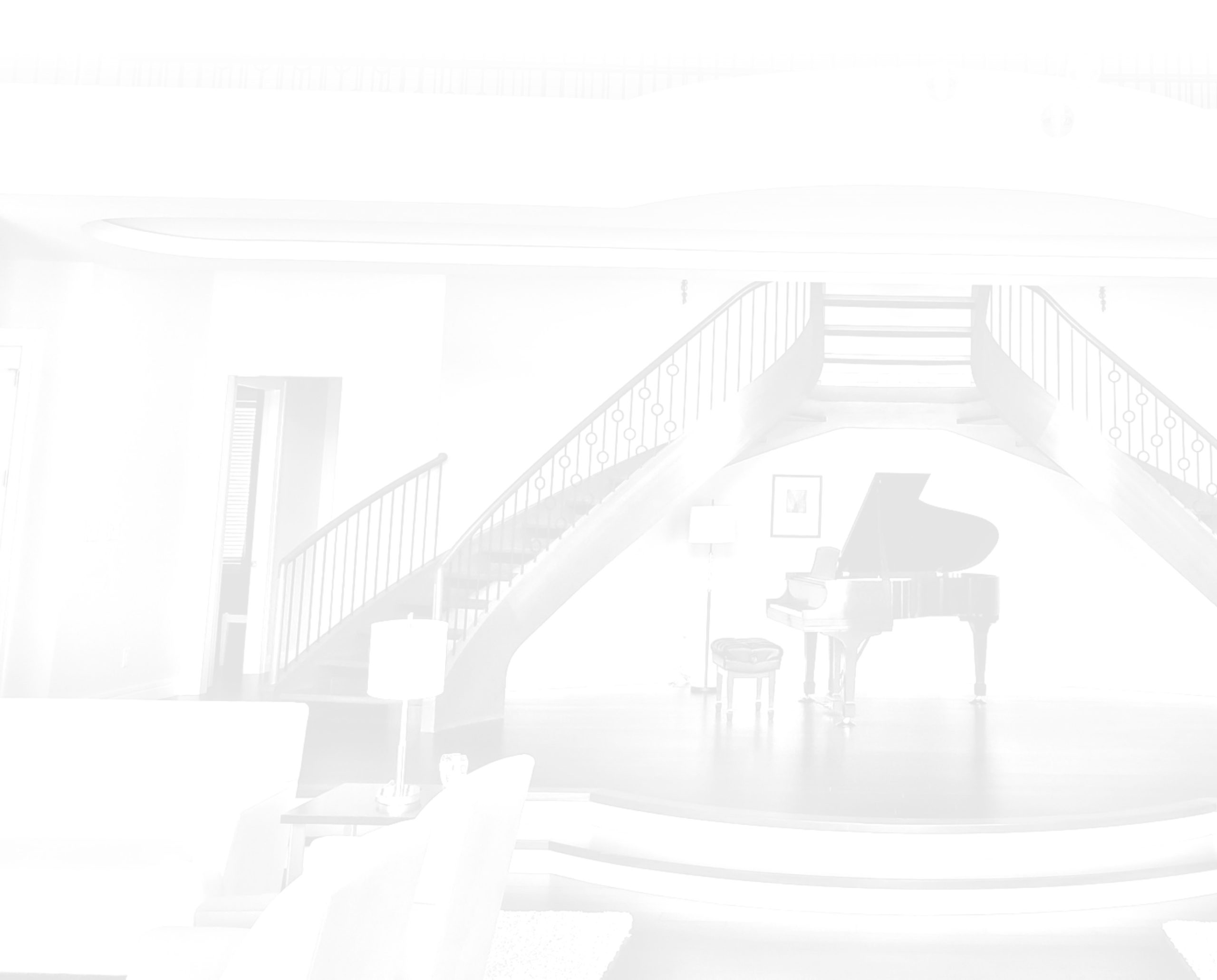 Photo of a custom built grand double staircase.